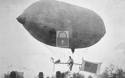 Man flying dirigible blimp - dirigible,
